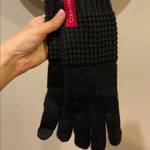 A pair of Calvin Klein’s gloves